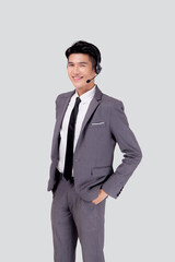 Portrait young asian business man call center wearing headset isolated on white background, agent with support and service, businessman is assistant for client with phone or helpline online.