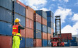 © tool51 - Engineer control loading Container from Cargo freight ship for import and export , support logistics transportation concept.