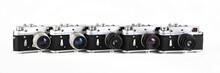 Old Film Photo Rangefinder Cameras On White Background.