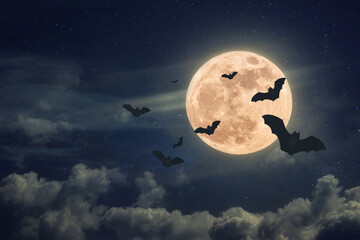 halloween night with scary full moon and bats