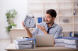 © Elnur - Young male employee in time management concept