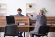 © Elnur - Two male employees working in the office
