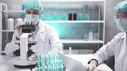 Wall Mural - scientist team has researching in the laboratory, meeting and writing analysis results of coronaviru