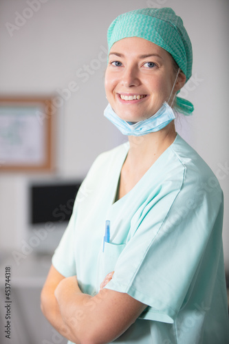 portrait of female doctor surgeon looking at camera