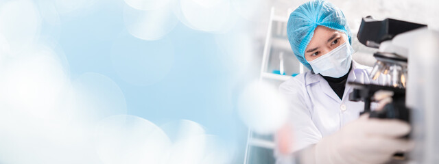 Wall Mural - professional researcher scientist working for medicine health research with microscope and laborator