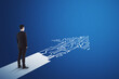 © Who is Danny - Businessman standing on abstract circuit arrow sketch on blue background with mock up place. Success and digital transformation concept.