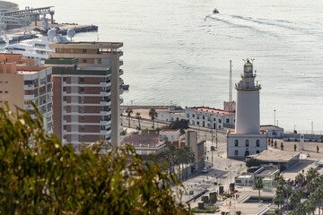 Sticker - Scenic view of the harbor with a lighthouse in Malaga, Spain