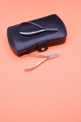 Canvas Print - Black leather closed manicure set bag and nipper with copy space