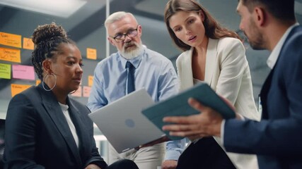 Poster - In Modern Office: Diverse Team of Managers Use Laptop and Tablet Computers at a Company Meeting Discussing Business Projects. Young, Motivated and Experienced Employees Brainstorm in Conference Room.