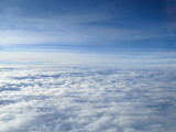 Fototapeta  - cloud landscape seen from airplane with blue sky