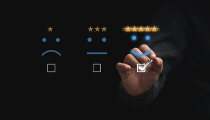 Wall Mural - Businessman touching button to select five stars with smiley face for the best excellent evaluation of customer satisfaction of product and service concept.