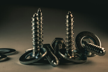 Poster - Closeup shot of drywall screw double bugle heads on an isolated background