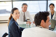 © KOTO - Doctors and businesswoman talking in meeting