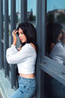 © shapovalphoto - attractive woman brunette posing outdoors