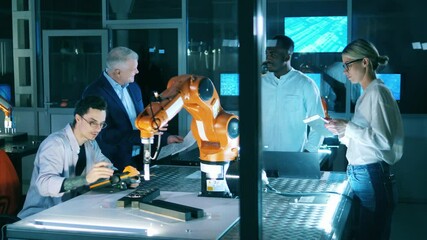 Wall Mural - robotics laboratory with it engineers doing a research