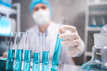 Wall Mural - scientist working with scientific equipment in laboratory science research term for medicine by chem