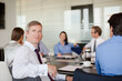 © KOTO - Business people sitting in meeting