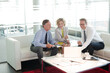 © KOTO - Business people sitting in meeting