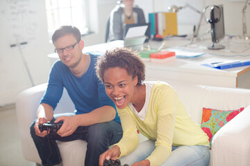 Couple playing video games together