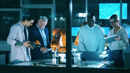 Wall Mural - group of engineers are analyzing a robotic mechanism