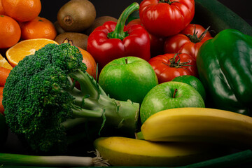 Poster - Closeup shot of colorful vegetables and fruits on a table