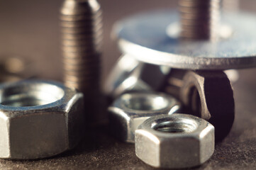 Poster - Closeup shot of details on metallic nuts and bolts