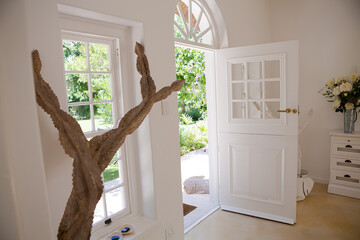 Wall Mural - Open front door of modern house