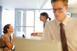 © KOTO - Businessman using laptop in office