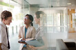 © KOTO - Business people talking in office