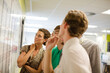 © KOTO - Business people reading blueprints in meeting