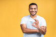 © denis_vermenko - Young african american indian black cooker man wearing apron isolated over yellow background. Ok sign.