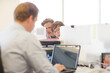 © KOTO - Businessman working on laptop at desk