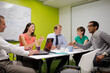 © KOTO - Business people talking in meeting