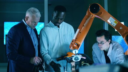 Wall Mural - it engineers are analyzing a robotic mechanism in the laboratory