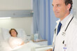 © KOTO - Doctor smiling in hospital room