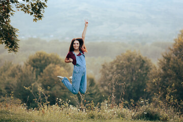 Happy Woman Jumping in Countryside Rural Landscape