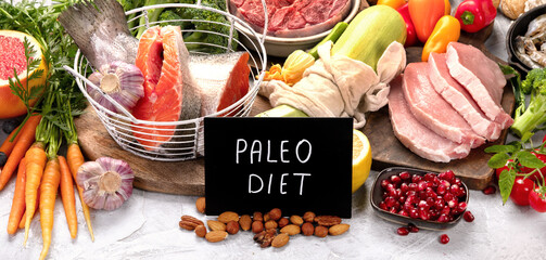 Wall Mural - Paleo diet food on light gray background.