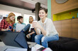 © KOTO - Woman drinking coffee in office