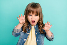Photo Of Funny Funky Small Girl Hands Claws Roaring Wear Jeans Jacket Isolated Aquamarine Color Background