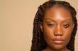 © Phiwo Ndlovu/Cultura Creative - Close-up of woman with braided hair