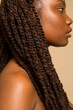 © Phiwo Ndlovu/Cultura Creative - Close-up of woman with braided hair