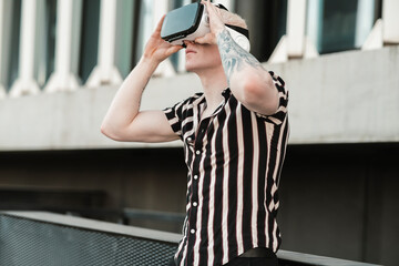 Wall Mural - young caucasian man with vr glasses