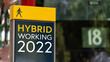 © WD Stock Photos - Hybrid Working 2022 sign in a busy commuter city center
