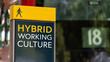 © WD Stock Photos - Hybrid Working Culture sign in a busy commuter city center