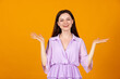 © Lustre Art Group  - Portrait of young amazed, surprised beautiful caucasian girl isolated on orange background