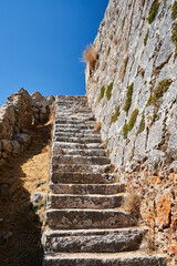 Wall Mural - Stone stairs in the medieval Venetian castle of St George's on the island of Kefalonia