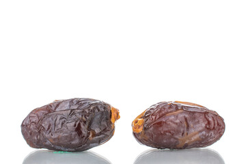 Two royal dates, close-up, isolated on white.