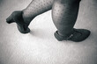 Legs of a woman in sexy polka dot stockings