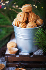 Christmas sweets cookies nuts with condensed milk on the festive table, Christmas decorations