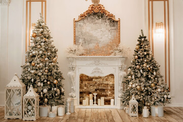 Two decorated Christmas trees on the sides of the hall and a fireplace in the center. Christmas and New Years with rich traditional home decor. Candles gifts in boxes and Christmas toys for christmas